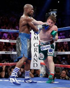 Floyd Mayweather Jr. and Canelo Alvarez boxing.