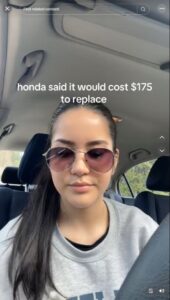 Woman in car, reacting to a $175 repair quote.