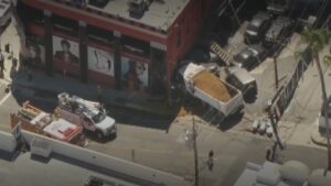 Dump Truck Crashes Into Whisky a Go Go Prior to Boy Hits Car Concert