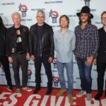 Foo Fighters band members at a Power to the Patients concert.
