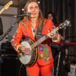 Julien Baker performing with a banjo.