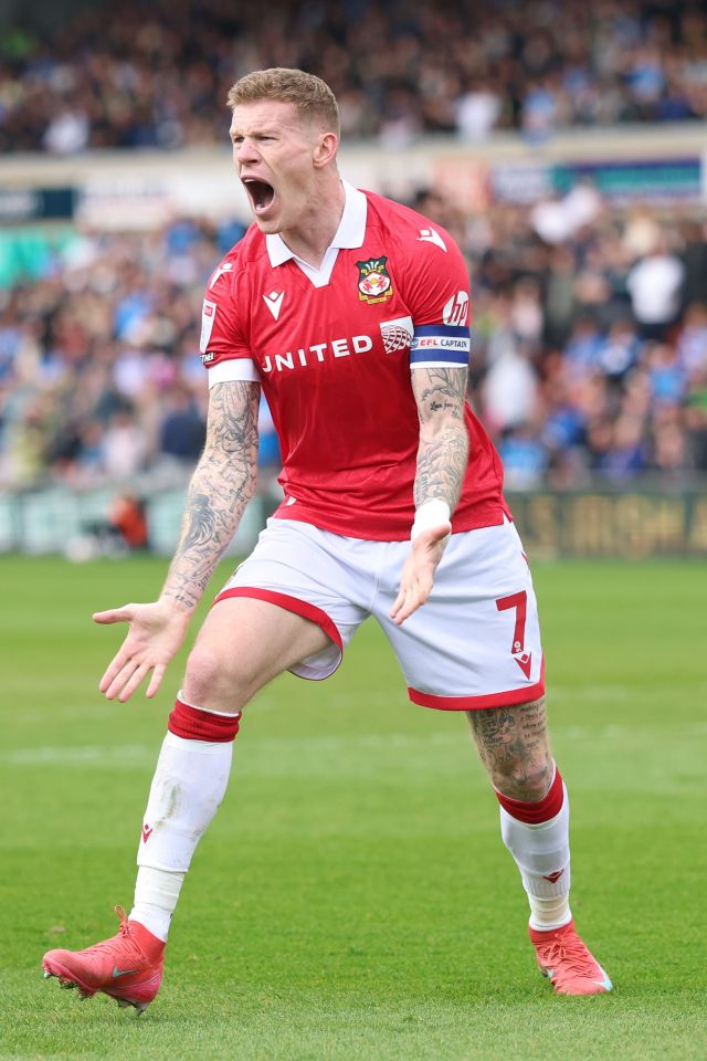 James McClean of Wrexham appeals during a soccer game.