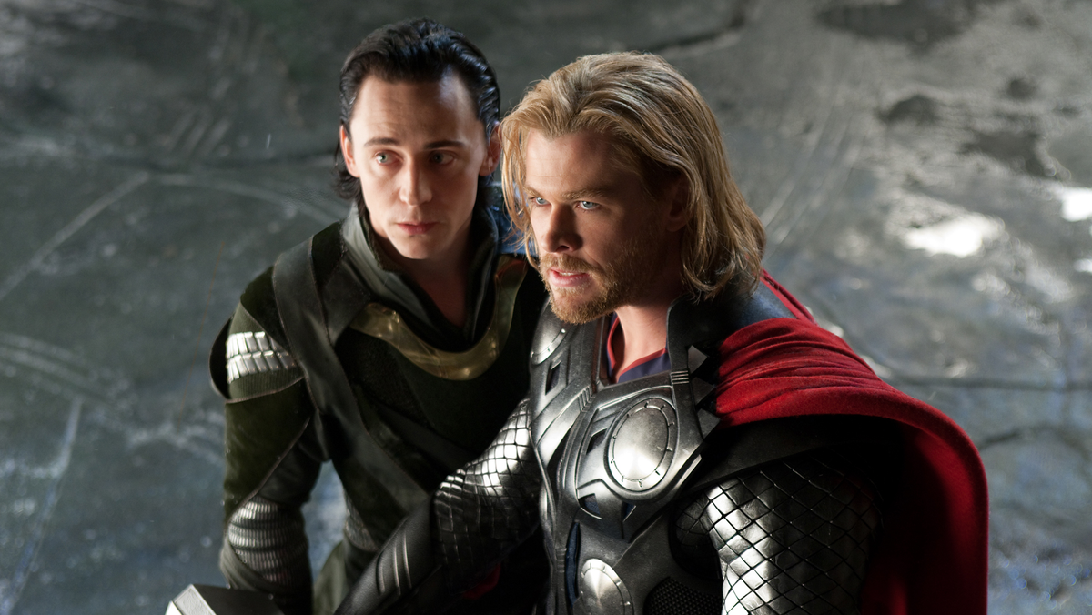 Chris Hemsworth and Tom Hiddleston as Thor and Loki in full costume