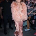 Jennifer Lopez arriving at a birthday celebration.