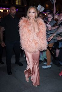 Jennifer Lopez arriving at a birthday celebration.