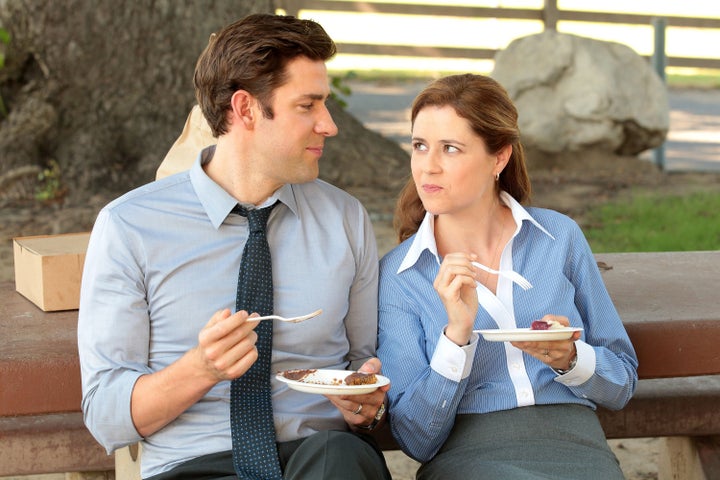 Since starring on the show, Jenna Fischer, seen here in a scene with John Krasinski, has rewatched all of the episodes for her "Office Ladies" podcast with her former co-star Angela Kinsey.