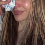 Jennifer Lopez with an ice pack on her eye.