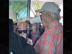 john elway at a party drinking tmzsports 2