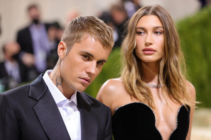 Justin Bieber's caption about wife Hailey Bieber's Vogue cover quickly became the focus of the story on Tuesday.