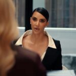 Kim Kardashian in a business meeting.