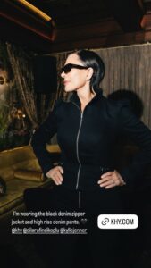 Kris Jenner wearing a black denim zipper jacket and high-rise denim pants.