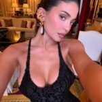Kylie Jenner selfie in a black dress.