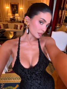 Kylie Jenner selfie in a black dress.