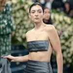 lorde-sheds-her-jacket-on-met-gala-red-carpet-to-unveil-revealing-look-