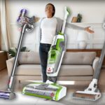 Happy Woman Surrounded By Vacuums Available On Amazon
