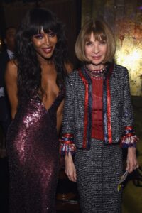 Naomi Campbell and Anna Wintour at a celebration.