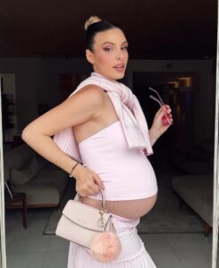 A photo of Lele Pons showing off her baby bump.