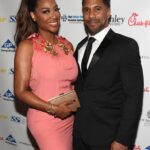 Kenya Moore and Marc Daly at an event.