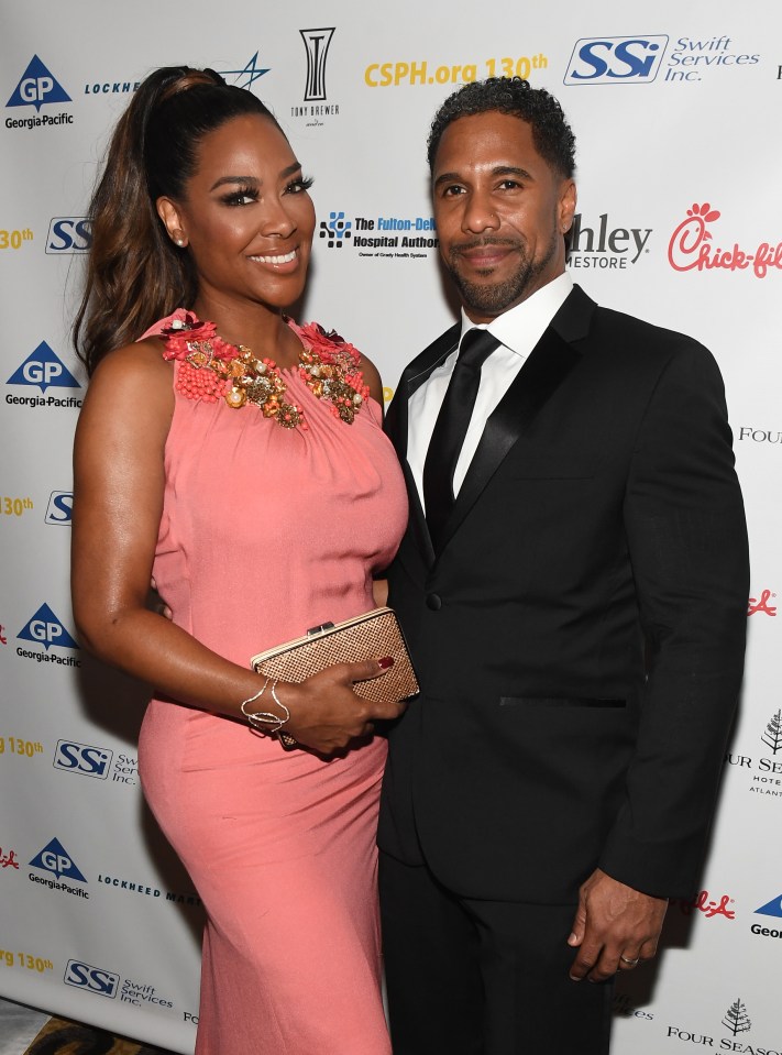 Kenya Moore and Marc Daly at an event.