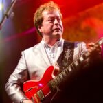 Rick Derringer of Ringo Starr's All Starr Band performing live on stage.