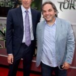 WES Producer Michael Bay (L) and Paramount Film Group President Adam Goodman attend the premiere of Paramount Pictures' "Teenage Mutant Ninja Turtles" at Regency Village Theater on August 3, 2014