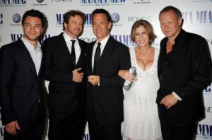 From left: Dominic Cooper, Colin Firth, Tom Hanks, Rita Wilson and Stellan Skarsgard attend the U.K. film premiere of “Mamma Mia” in 2008 in London.