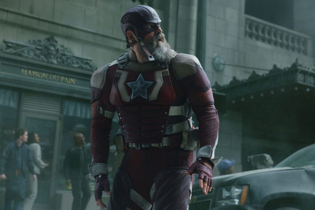 Red Guardian (David Harbour) looking over his shoulder during a battle