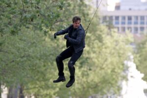 Tom Cruise performs a stunt on set for 'Mission: Impossible 6 Gemini' filming on April 10, 2017, in Paris, France