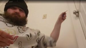 Twitch streamer locked out of bedroom mid-stream and refuses to quit until he breaks in