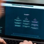 Someone using ChatGPT on a laptop
