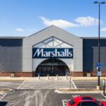 A drone / aerial shot of a Marshall's department store, which is owned by the TJX Companies. The chain has off price products and is linked with TJ Maxx and Homegoods