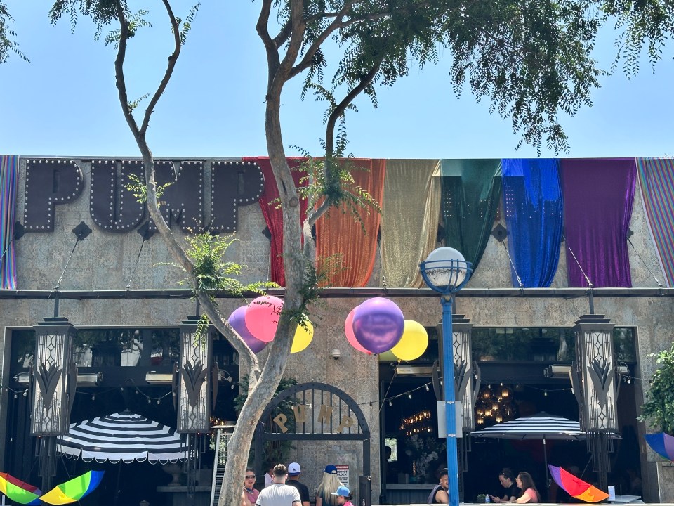 Lisa Vanderpump's PUMP restaurant decorated with rainbow flags and balloons for West Hollywood Pride.