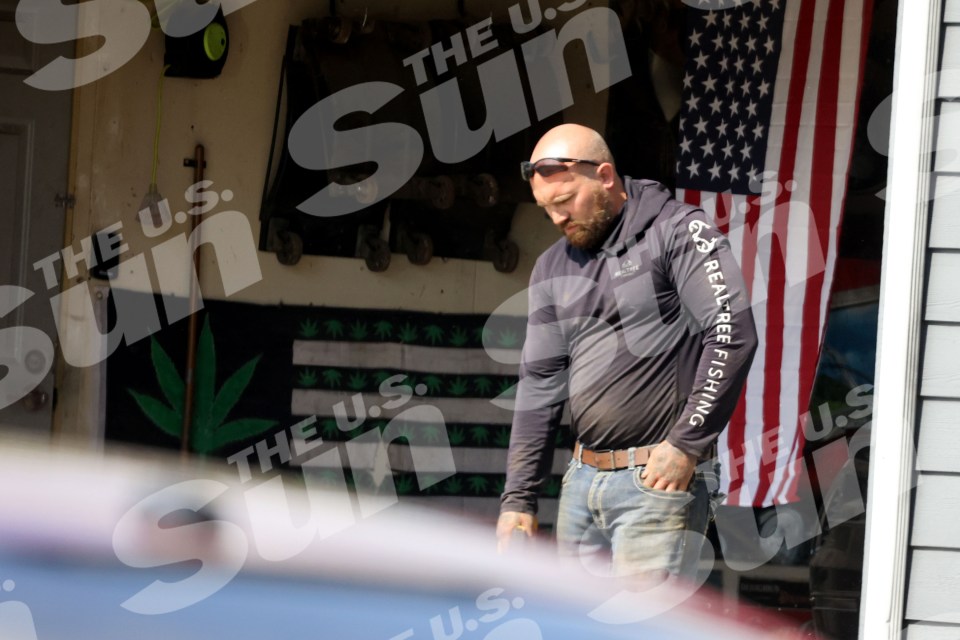 Photo of Adam Lind outside his home.