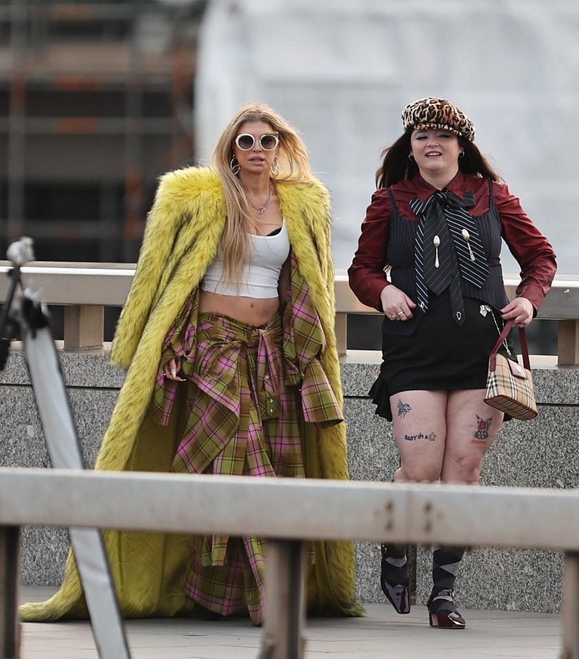 Fergie and Megan Slater filming a scene for the Netflix film *Toomuch* on London Bridge.