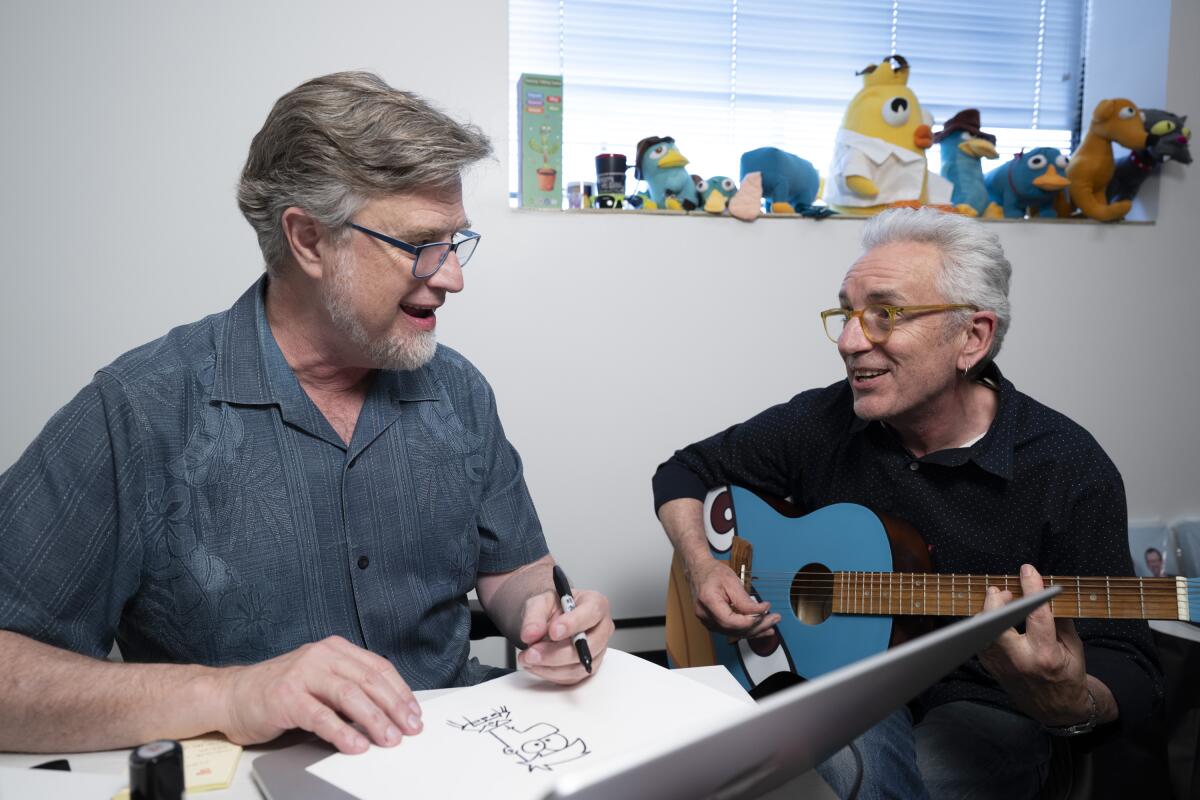 PHINEAS AND FERB. (Disney/Richard Harbaugh) DAN POVENMIRE (CO-CREATOR/EXECUTIVE PRODUCER), JEFF "SWAMPY" MARSH (CO-CREATOR/EXECUTIVE PRODUCER)