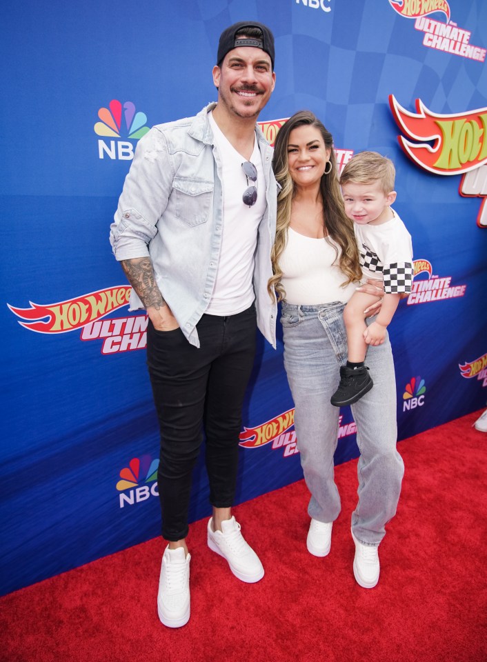 Jax Taylor, Brittany Cartwright, and their son at the Hot Wheels: Ultimate Challenge press event.