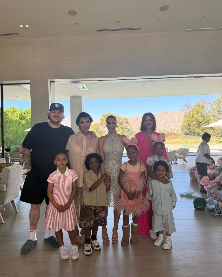 The Kardashian family and their children posing for an Easter photo.
