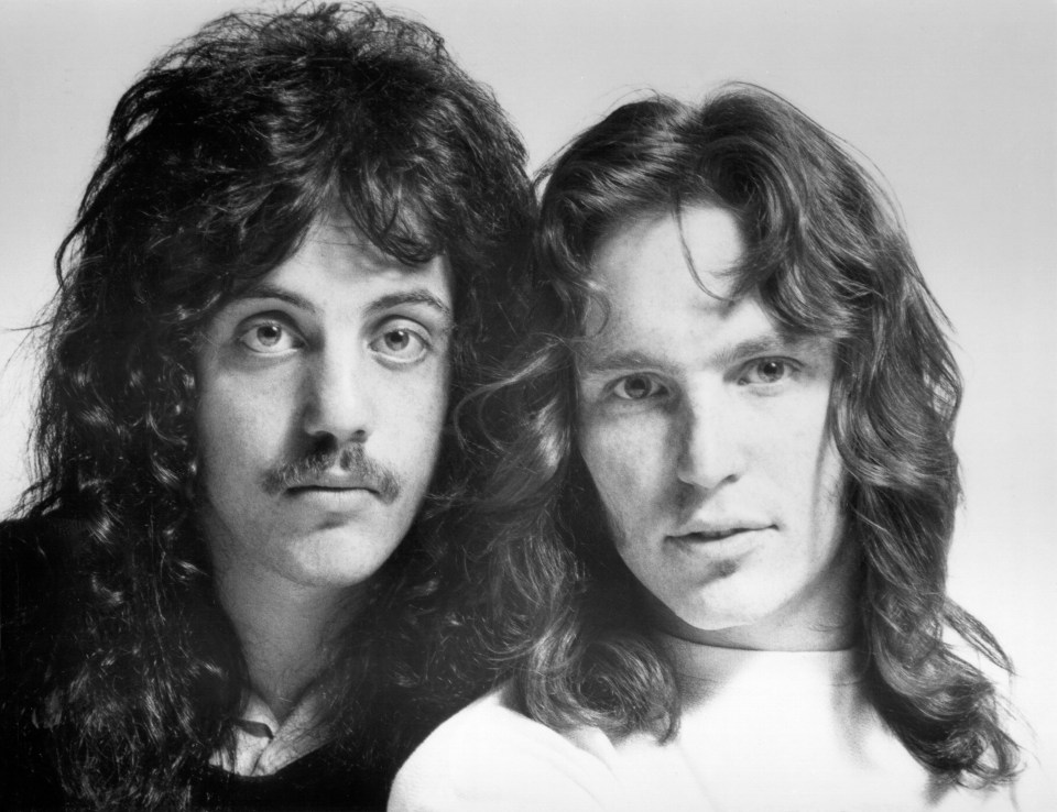 Black and white portrait of Billy Joel and Jon Small.