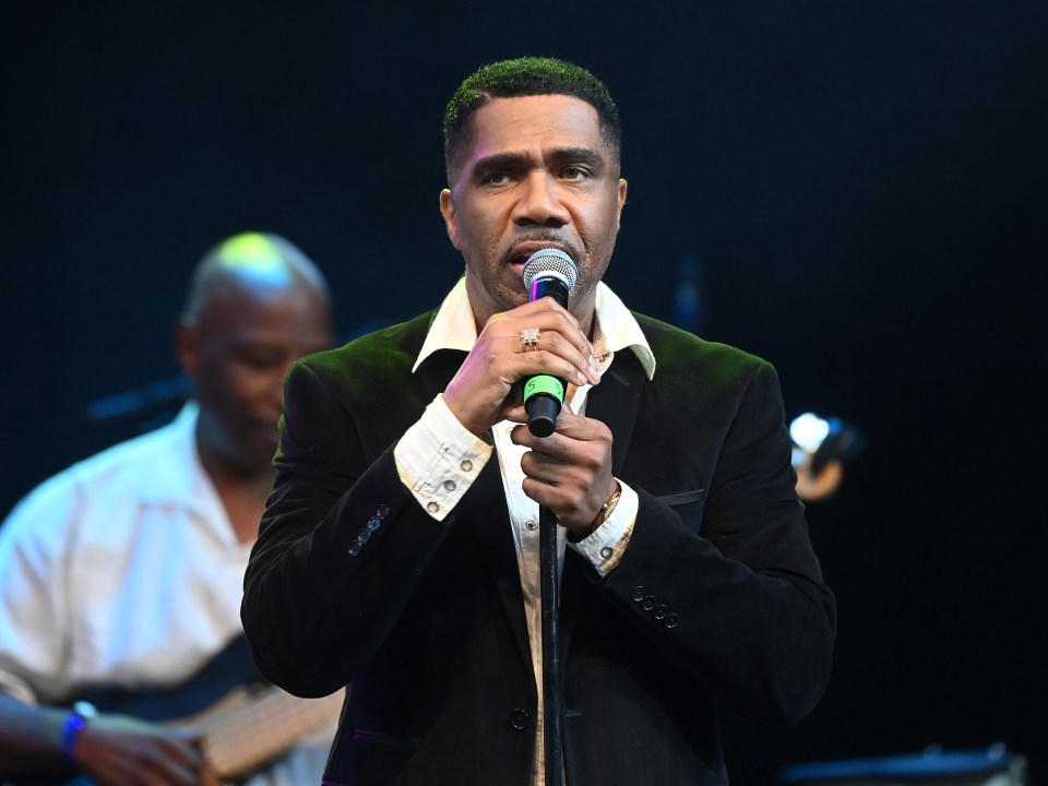 Wayne Lewis of Atlantic Starr performing onstage.