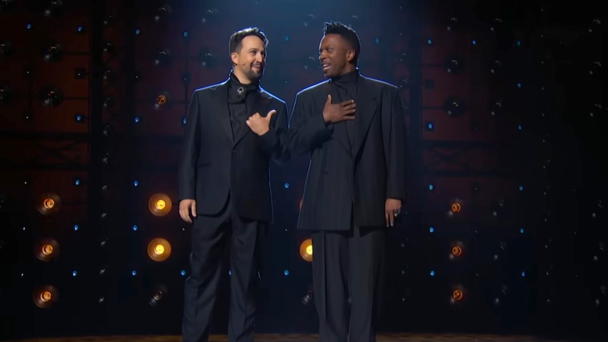 Lin-Manuel Miranda and Leslie Odom Jr. on stage at the Tony awards in black suits for original Hamilton broadway cast reunion