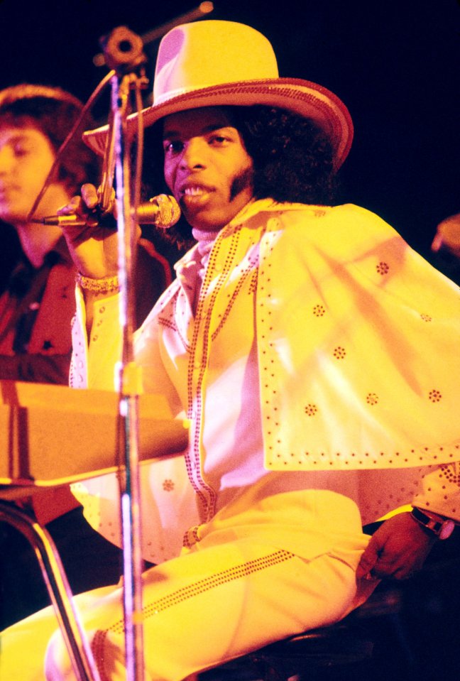 Sly Stone of Sly & the Family Stone performing on stage.