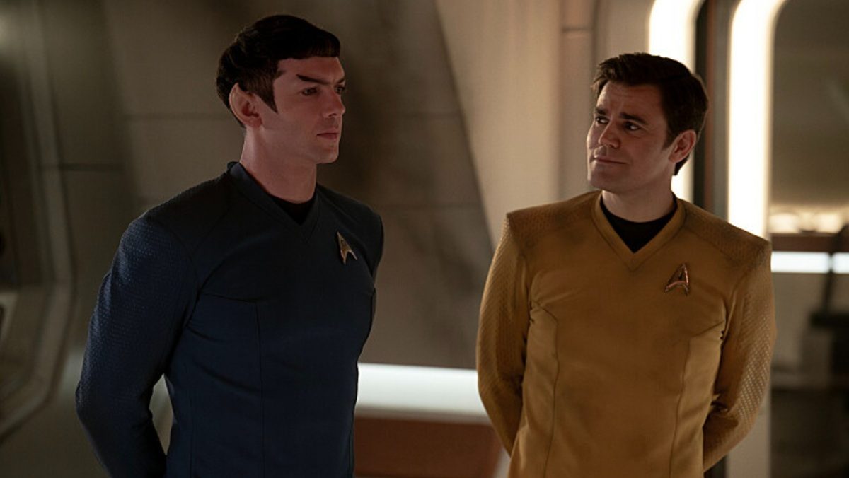 Spock (Ethan Peck) and Kirk (Paul Wesley) walk together in Star Trek: Strange New Worlds.