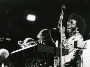 BOSTON - AUGUST 26: Wilson Pickett and Sly and the Family Stone were the two star attractions at Harvard Stadium to help Miss Elma Lewis fund raise for her National Center for Afro-American Artists. Sly led one one of the group's favorite hits, "Dance to the Music."