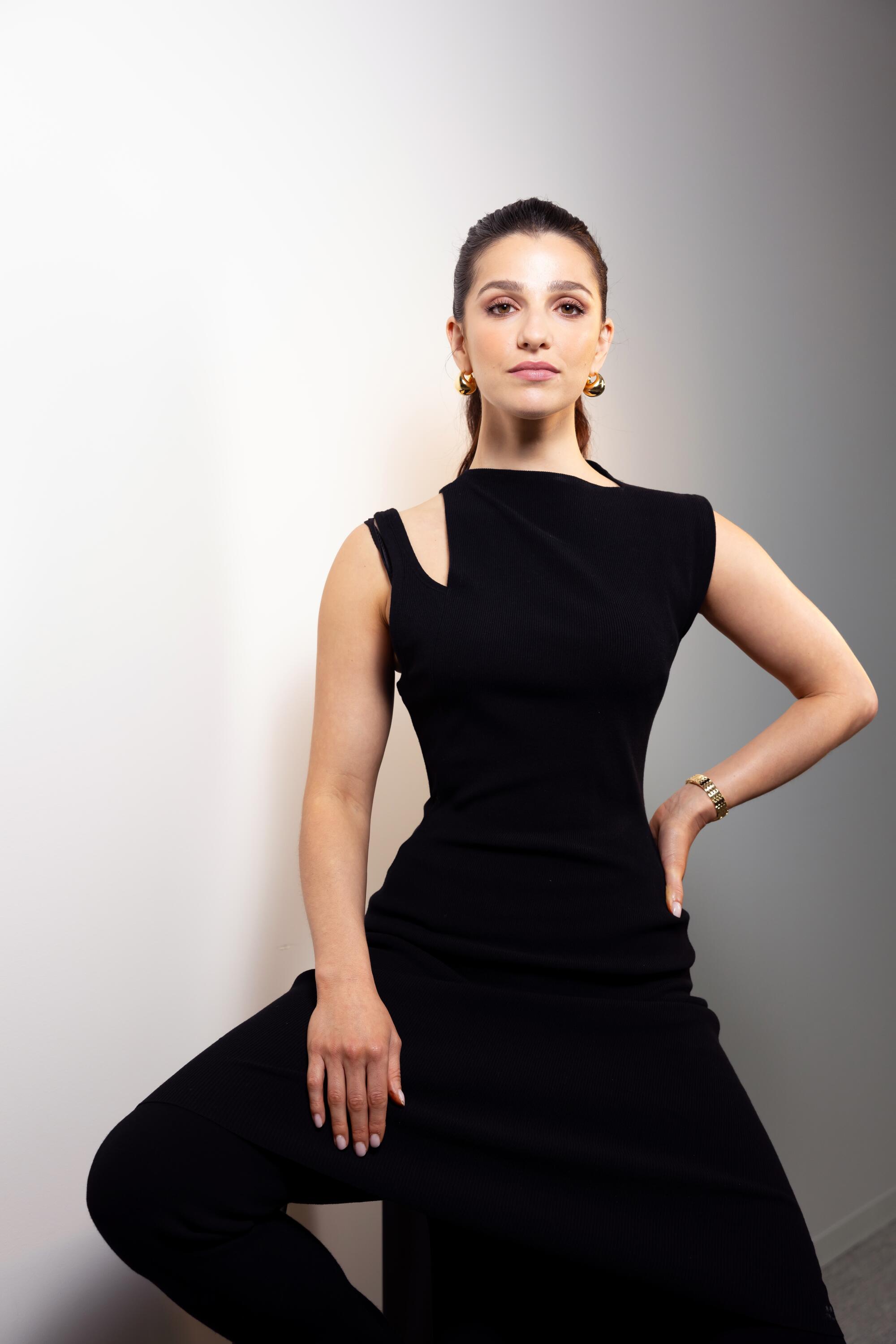 Marisa Abela in a black dress.