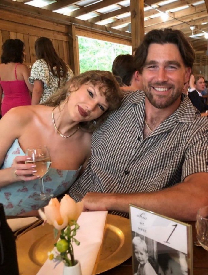 Headline: Travis Kelce and Taylor Swift spark marriage talk of their own after loved-up pair spotted attending cousin's ceremony,