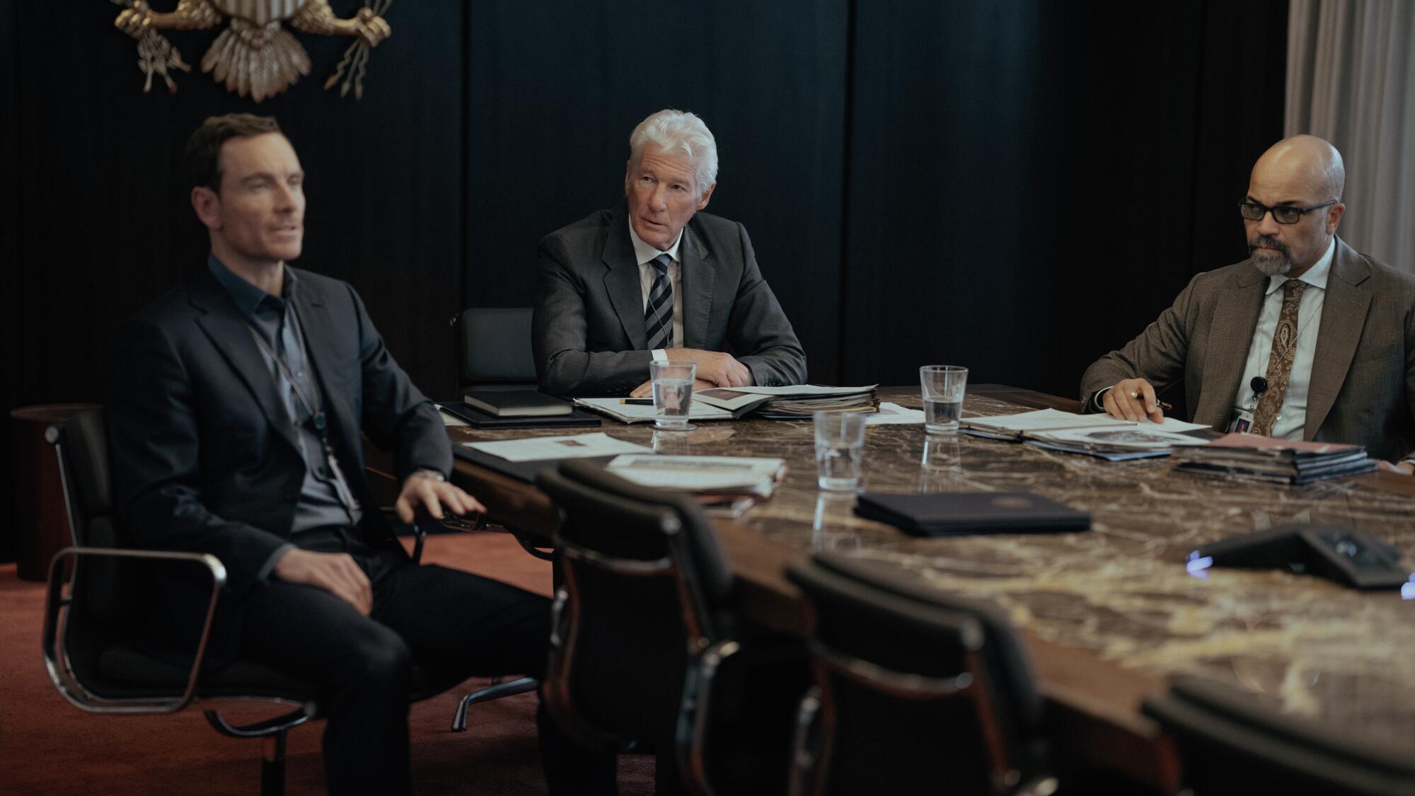 Fassbender, Gere and Wright at work at "The Agency."