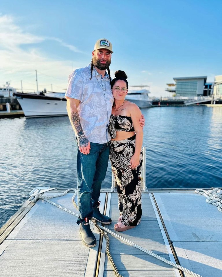 Jenelle Evans and a man standing on a dock.