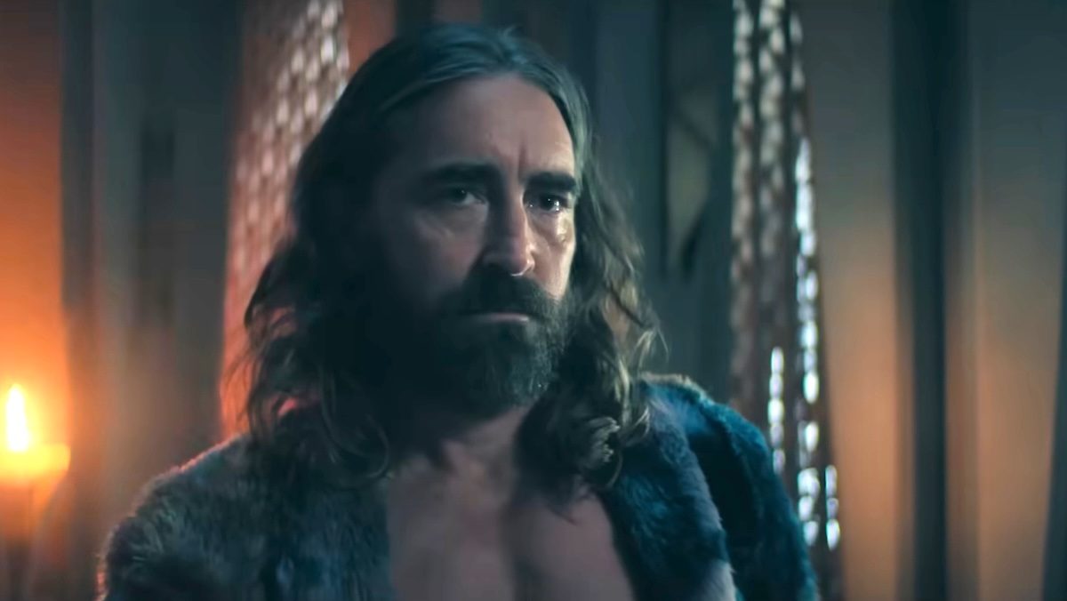 A long-haired and bearded Lee Pace with an open robe from Foundation season three trailer
