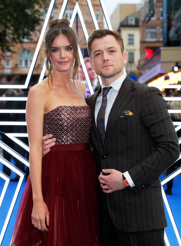 Taron Egerton and Emily Thomas at the Rocketman film premiere.