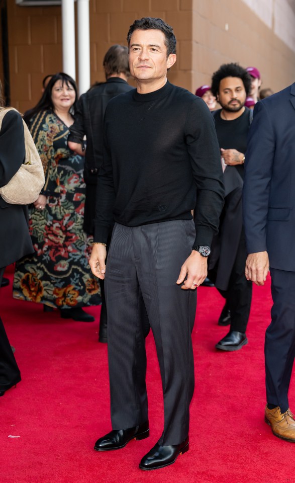 Orlando Bloom arriving at the "Deep Cover" premiere.
